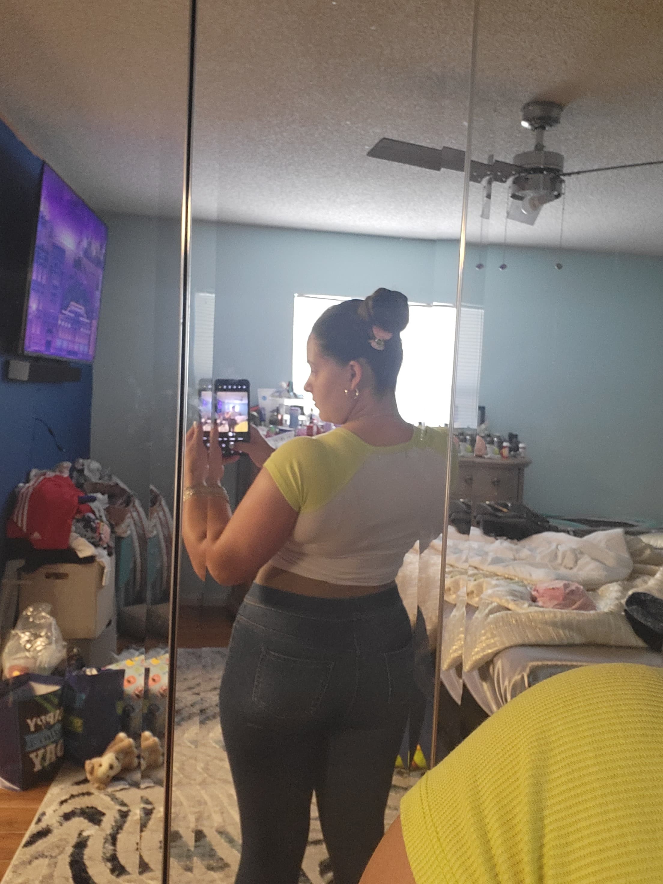 Emily Nunez raising her arms during her EmiFit comeback journey